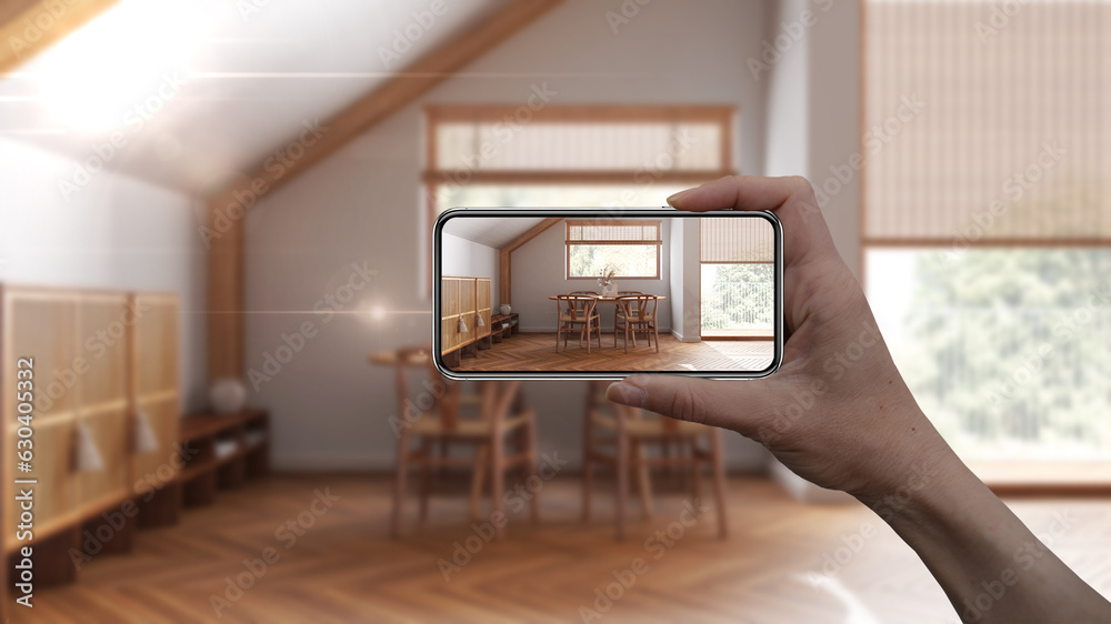 Hand holding smart phone, AR application, simulate furniture and ...