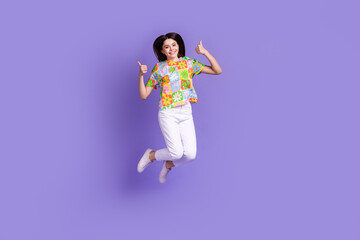 Sticker - Full body photo of schoolgirl jump double thumbs up recommendation feedback rate summer camp tourist isolated on violet color background