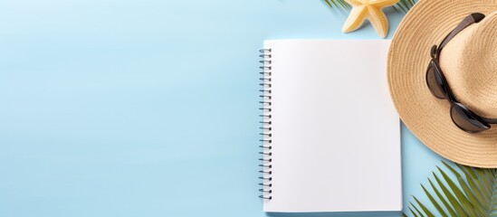 Poster - a blank writing book is a background of summer beach accessories, allowing for copy space. The flat lay provides ample area for writing or designing.