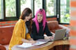 © mojo_cp - Asian transgender Pink Hair Business People Meeting Design Ideas for new start up project working together meeting business plan listen coworker and discussing team work Gender equality LGBTQ+ concept
