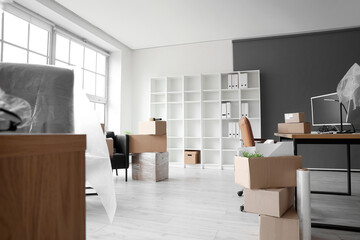 Sticker - Workplace with cardboard boxes in office on moving day