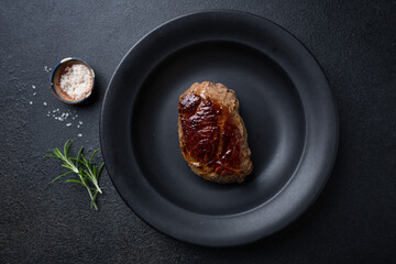 Wall Mural - Tasty grilled steak with rosemary