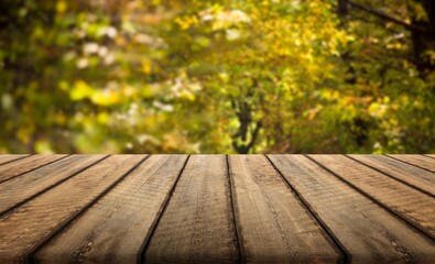 Wall Mural - Wooden empty table top on nature background