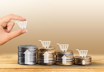 Poster - Stack of golden coins with shopping cart image