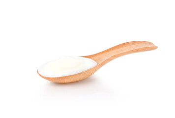 yogurt in wooden spoon isolated on white background