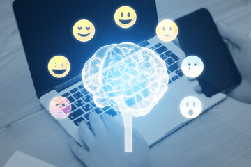 Aufkleber - Development of emotional intelligence concept. Polygonal human brain and various human emotions: fear, surprise, joy, sadness, anger. Close up of hands using laptop with hologram on blurry background.