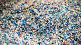 Fototapeta  - Shredded plastic garbage at waste recycling factory
