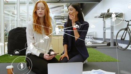 Poster - Animation of network of connections over diverse businesswomen using laptop