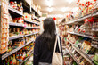 © Austockphoto - 20-something Asian woman shopping buying groceries at a supermarket