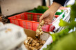 © Austockphoto - Picking up ginger root while buying groceries at a supermarket