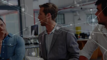 Poster - Animation of dots connected with lines over caucasian coworkers brainstorming in office