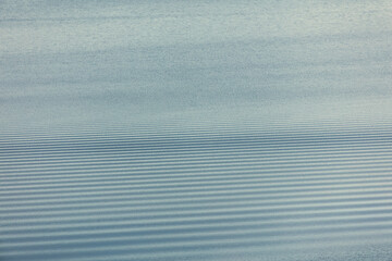 Sticker - abstract background - water ripples on the surface of the lake