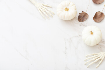 Sticker - white halloween pumpkins with decor on marble background