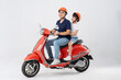 © 1112000 - father and son wearing helmets and riding motorbikes