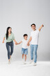 © 1112000 - a family posing on a white background