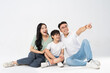 © 1112000 - a family posing on a white background