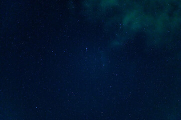 Wall Mural - stars on background of the night starry sky. milky way, galaxies and universes on a dark blue backgr
