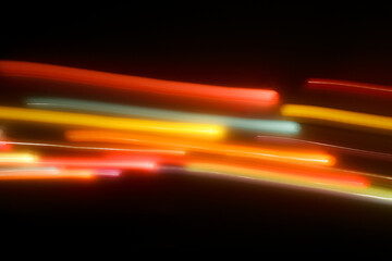 Wall Mural - fast move lines of colorful light twinkle, long exposure motion in the dark , abstract background