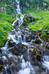 Wall Mural - Waterfall in Fagaras Mountains, Romania.