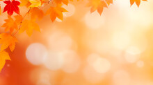 Defocused Autumn Background With Bokeh And Blurry Red Yellow And Orange Autumn Leaves
