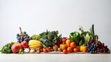 Fototapeta Tęcza - Colorful assortment of fruits and vegetables displayed on a table