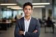 © Moritz - Leader in Innovation: High-Resolution Portrait of a Young Tech CEO Standing in a Bustling Office