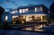 © 2rogan - An image capturing the external view of a contemporary house illuminated with outdoor lighting during the nighttime.