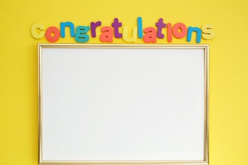colorful alphabet word congratulations and frame on yellow background. graduation concept. primary s