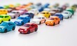 A sea of toy cars covered the white table, providing endless possibilities for imaginative play