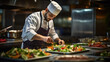 © PaulShlykov - Cook man neatly decorates the dish. young professional chef adding some piquancy to meal. in modern kitchen, at work in uniform
