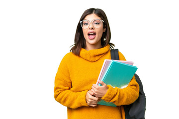 Wall Mural - Young student woman over isolated chroma key background with surprise facial expression