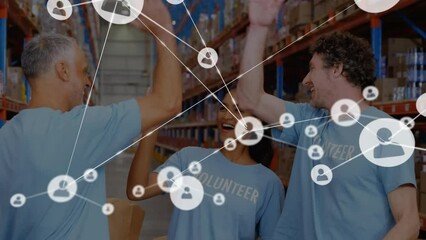 Poster - Animation of network of connections with icons over diverse volunteers working in warehouse