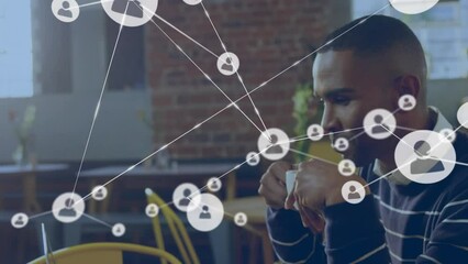 Poster - Animation of network of profile icons against biracial man drinking coffee at a cafe