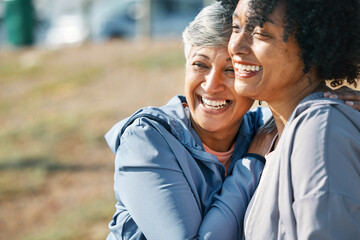 Wall Mural - Senior women, hug and fitness with laughing, friends and joke outdoor happy from workout. Exercise, park and funny female woman with embrace, support and bonding together with health and wellness