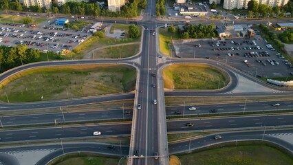 Sticker - Aerial of the traffic on the road and the interchange with buildings in the background