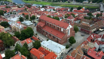 Wall Mural - Drone shot over Kaunas town hall with a town view and red houses