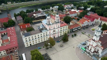 Wall Mural - Drone shot over Kaunas town hall with a town view and red houses