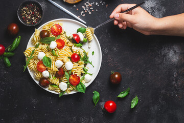 Wall Mural - Pasta with mozzarella and tomatoes .Pasta caprese