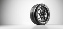 Car Tire In White Background. Tire Isolated On White Background With Copy Space.	
