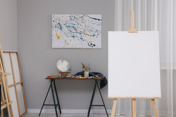 Poster - Artist's studio with easels, canvases and painting supplies