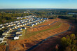 © bilanol - View from above of densely built residential houses under construction in south Carolina residential area. American dream homes as example of real estate development in US suburbs