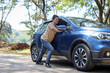 © Gatot - Young Asian man pushing his broken car on the road alone