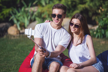 Canvas Print - Young people resting outdoors