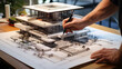 canvas print picture - Hand of architector designer drafting a sketch design villa the building becoming real