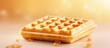 Belgian waffle texture background with square waffled cookie mockup. Soft golden Belgium waffles