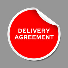 Poster - Red color peel sticker label with word delivery agreement on gray background