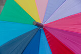 Fototapeta Tęcza - rainbow colored umbrella