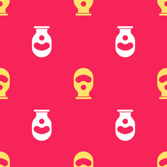 Wall Mural - Yellow Balaclava icon isolated seamless pattern on red background. A piece of clothing for winter sports or a mask for a criminal or a thief. Vector