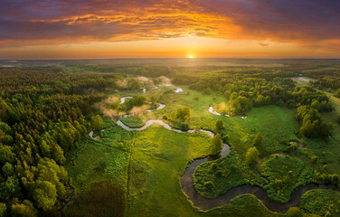 Wall Mural - Beautiful spring morning over the forest and river - drone aerial view
