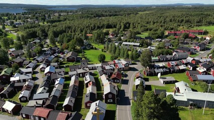 Canvas Print - Drone view of Gammelstad Church and Town rural houses with forest trees in Sweden